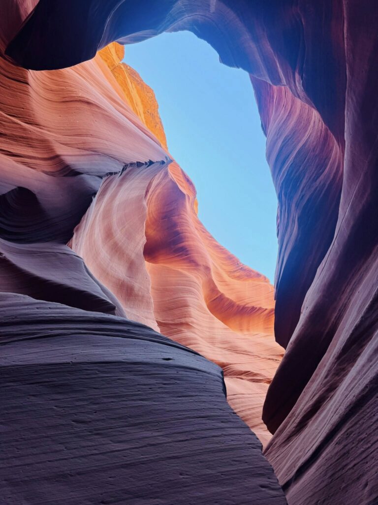 Interior view of Antelope Canyon in Arizona with narrow sandstone walls and natural light