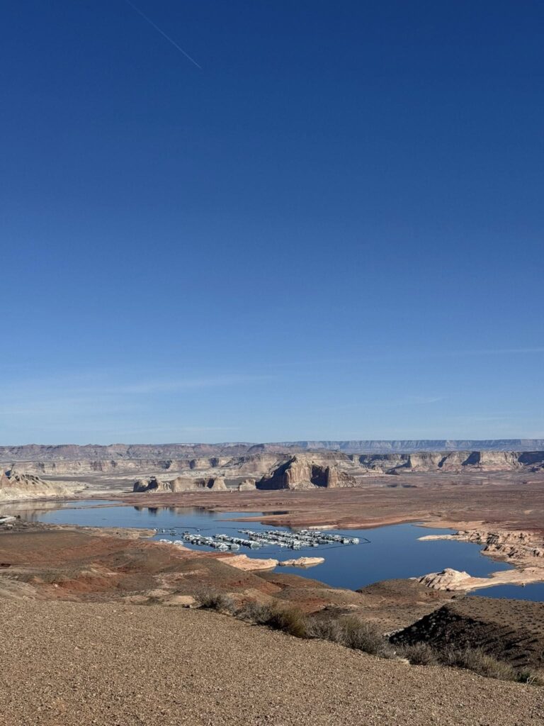 View of Lake Powell near Page Arizona surrounded by desert landscape and rock formations